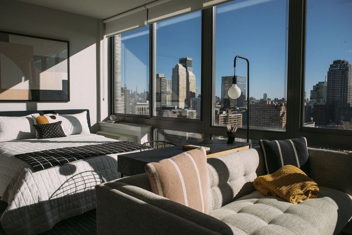 A studio apartment at 235 Grand Street with views of Manhattan.