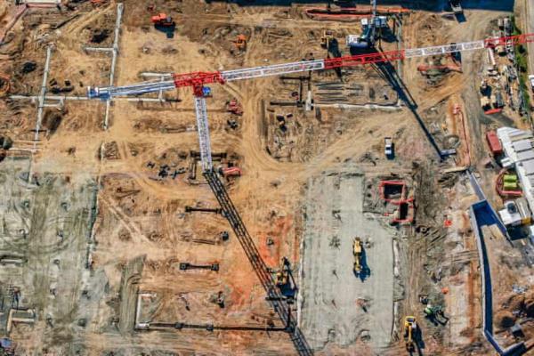 Aerial view of new co<em></em>nstruction site with tower crane in Sydney’s north-west