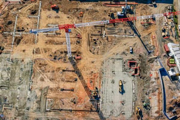 Aerial view of new construction site with tower crane in Sydney’s north-west