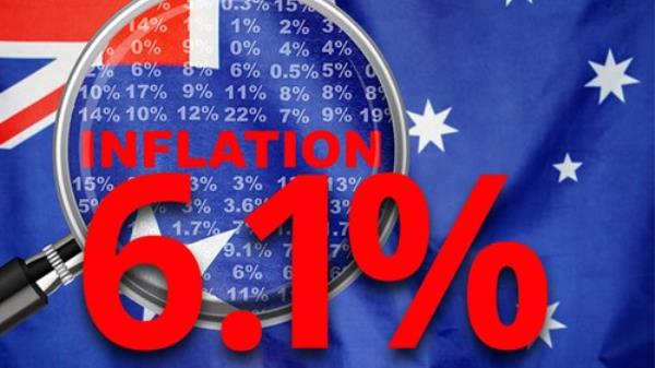 Magnifying glass focused on the word inflation on Australia flag background. 