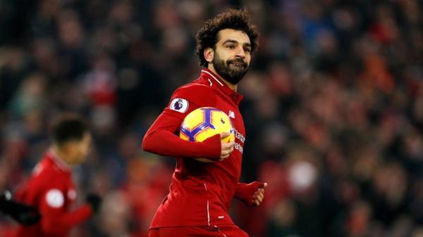 Liverpool's Mohamed Salah celebrates scoring his side's first goal of the game during the Premier League match at Anfield, Liverpool. PRESS ASSOCIATION Photo. Picture date: Saturday January 19, 2019. See PA story SOCCER Liverpool. Photo credit should read: Darren Staples/PA Wire. RESTRICTIONS: EDITORIAL USE onLY No use with unauthorised audio, video, data, fixture lists, club/league logos or "live" services. online in-match use limited to 120 images, no video emulation. No use in betting, games or single club/league/player publications.
