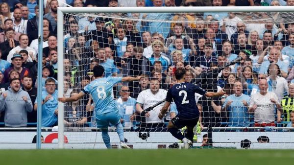 Soccer Football - Premier League - Manchester City v Aston Villa - Etihad Stadium, Manchester, Britain - May 22, 2022 Manchester City's Ilkay Gundogan scores their third goal Action Images via Reuters/Jason Cairnduff EDITORIAL USE ONLY. No use with unauthorized audio, video, data, fixture lists, club/league logos or 'live' services. online in-match use limited to 75 images, no video emulation. No use in betting, games or single club /league/player publications. Please contact your account repres