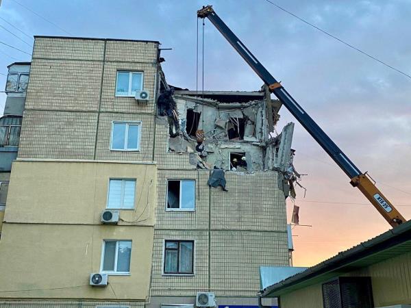 View shows a residential building damaged by a Russian military strike in location given as the town of Nikopol