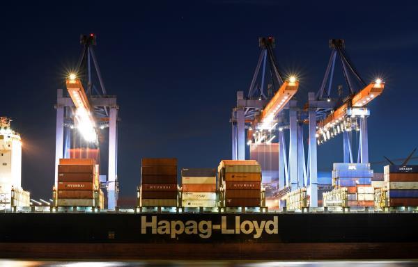 A Hapag Lloyd container ship is loaded at the shipping terminal Altenwerder in the harbour of Hamburg