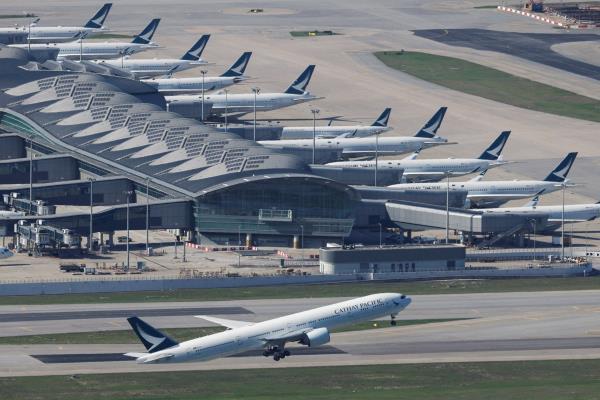A Cathay Pacific aircraft takes off at the airport, during the coronavirus disease (COVID-19) pandemic, in Hong Kong