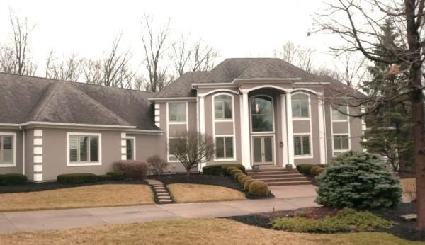 The Holiday's home with dated pillars