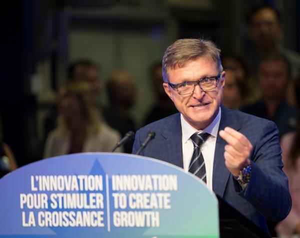 Marc Parent, president and CEO of CAE Inc., speaks during a news conference in Montreal, Quebec