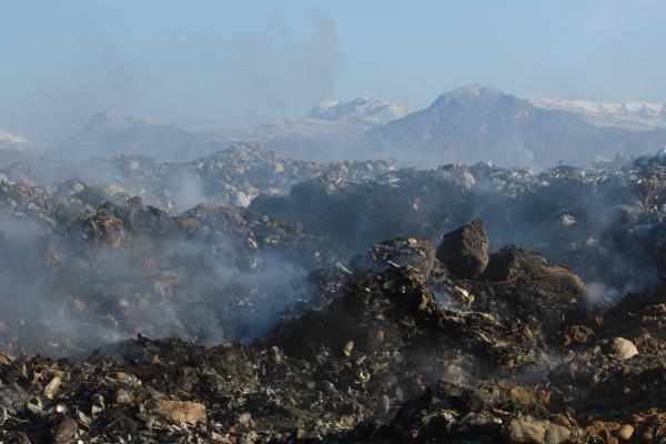 Garbage is seen collected from an area which used to be a landfill and will be diverted into a green park, in Zakho, district of Dohuk