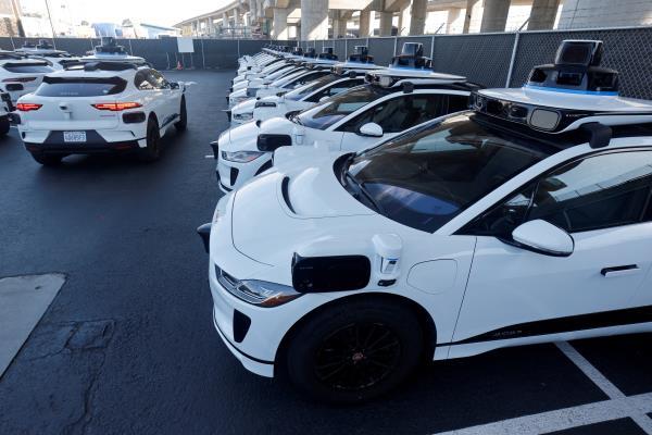 Jaguar I-Pace electric vehicles are tested at Waymo's operations center in San Francisco
