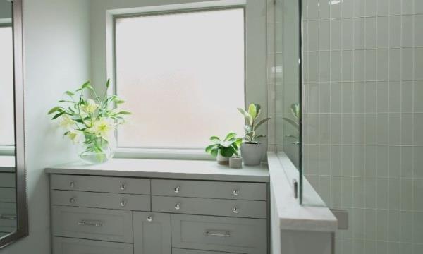 Custom cabinet where tub once stood