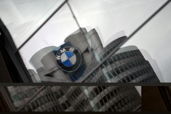 The logo of German car manufacturer BMW is seen at the company headquarters in Munich
