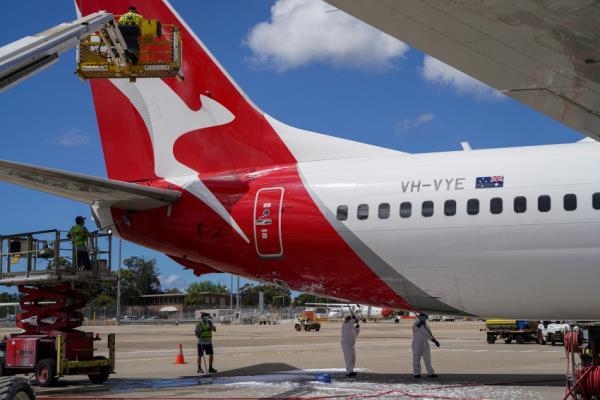 FILE PHOTO: Qantas begins preparing and equipping planes for return of international flights in Sydney
