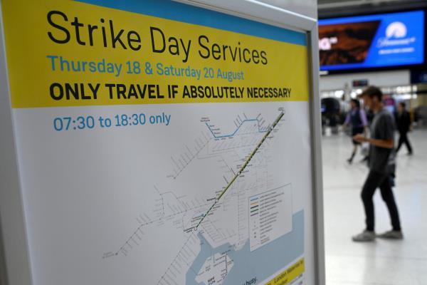 Reduced train operations as rail workers in Britain strike over pay and terms