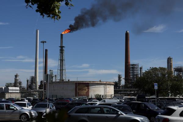 A pilot flame burns atop Shell Energy and Chemicals Park Rhineland near Cologne