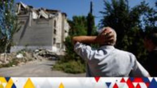 62-year-old Ukrainian Arkadii looks at his destroyed house, as Russia's attack on Ukraine continues, in Toretsk, Donetsk region, Ukraine August 22, 2022. REUTERS/Ammar Awad