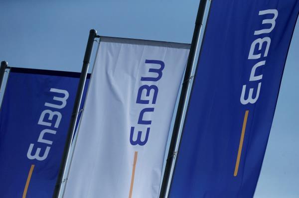 Flags of German power supplier EnBW Energie Baden-Wuertemberg AG are pictured at the company's headquarters in Karlsruhe