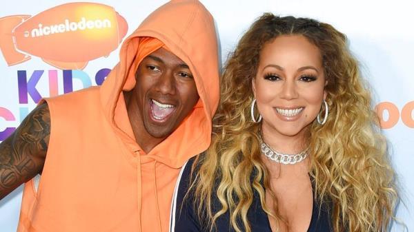 Nick Cannon, left, and Mariah Carey arrive at the Kids' Choice Awards at the Galen Center on Saturday, March 11, 2017, in Los Angeles. (Photo by Jordan Strauss/Invision/AP)


