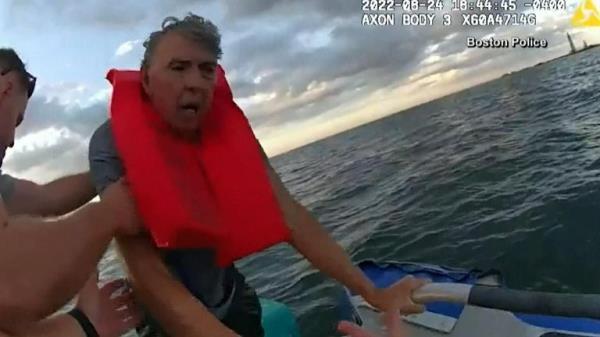 Men pulled to safety after boat started sinking off Boston coast. Pic: Boston Police