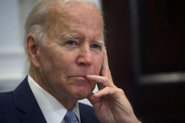 U.S. President Joe Biden meets with officials on Women's Equality Day at the White House