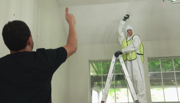 Contractor Victor advises Jenn Todryk on getting rid of a popcorn ceiling.