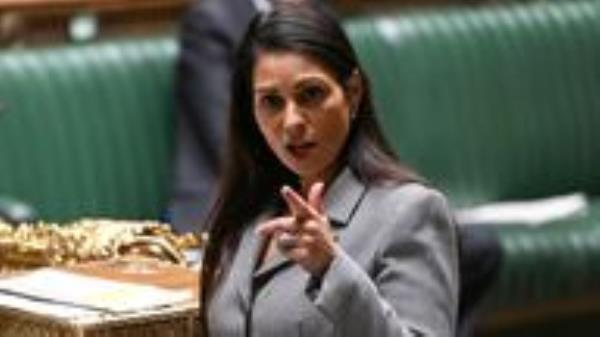 Britain's Home Secretary Priti Patel speaks during a statement on Migration and Economic Development Partnership with Rwanda in London, Britain June 15, 2022. UK Parliament/Jessica Taylor/Handout via REUTERS THIS IMAGE HAS BEEN SUPPLIED BY A THIRD PARTY. MANDATORY CREDIT. IMAGE MUST NOT BE ALTERED.
