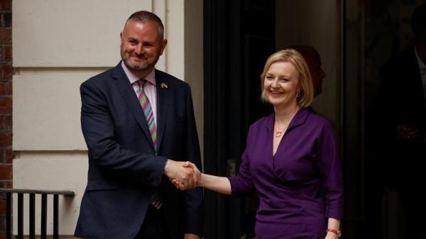 Liz Truss shakes hands with Chairman of the Conservative Party Andrew Stephenson as she arrives at the Conservative Party headquarters, after being announced as Britain's next Prime Minister, in London, Britain September 5, 2022. REUTERS/John Sibley
