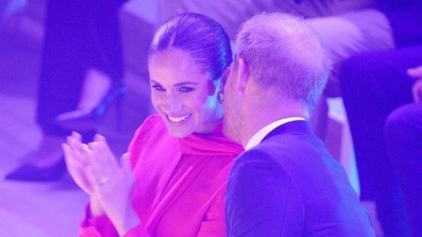 The couple ahead of Meghan's speech