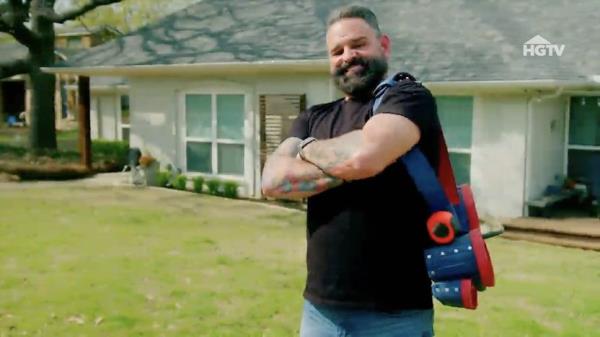 General contractor Russell Holmes drawing plans for a renovation.