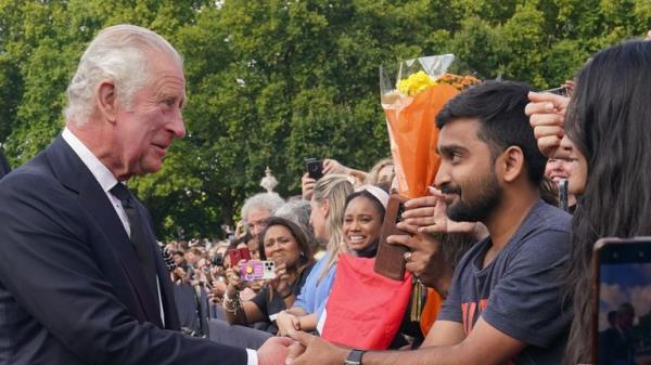 King Charles III is greeted by well-wishers during a walkabout to view tributes left outside Buckingham Palace, London, following the death of Queen Elizabeth II on Thursday. Picture date: Friday September 9, 2022.