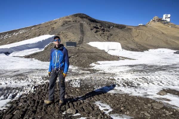 Glaciologist Fischer poses at the newly uncovered Zanfeluron path at Glacier 3000 in Les Diablerets