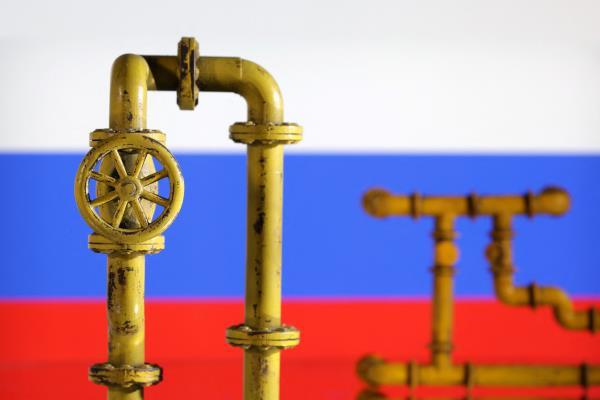 Illustration shows natural gas pipeline and Russian flag