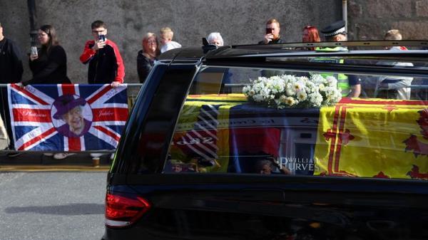 The hearse carrying the coffin of Britain's Queen Elizabeth passes through the village of Ballater, near Balmoral, Scotland, Britain, September 11, 2022. REUTERS/Kai Pfaffenbach
