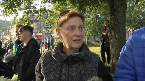Crowd member visiting Ballater to see the Queen's coffin