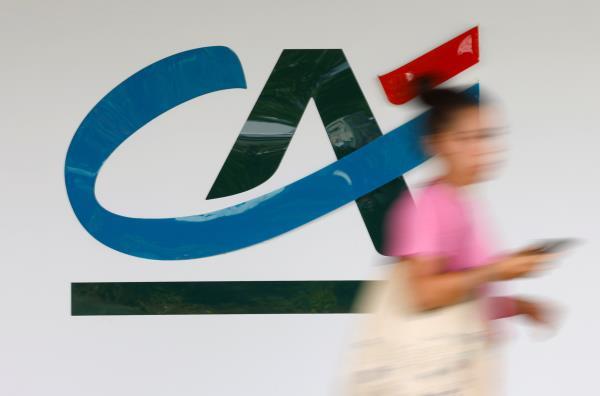 Logo of Credit Agricole outside a bank office in Reze