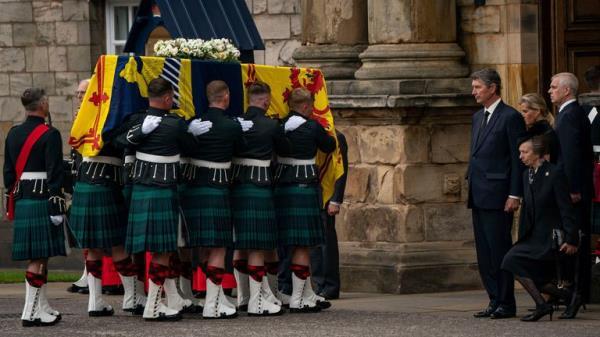 The Princess Royal curtsied as she watched the Queen's coffin being carried into the Palace of Holyroodhouse. Pic: AP