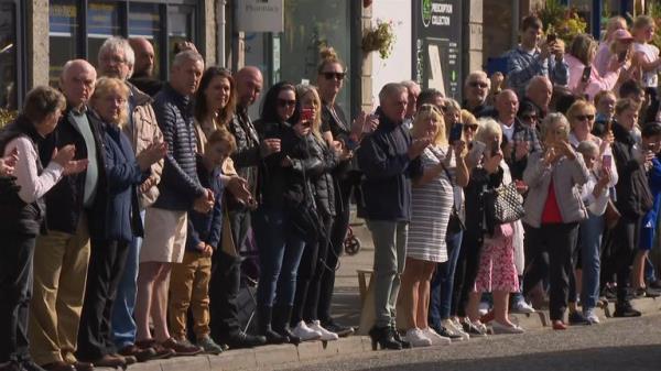 Queen's coffin travels through Banchory
