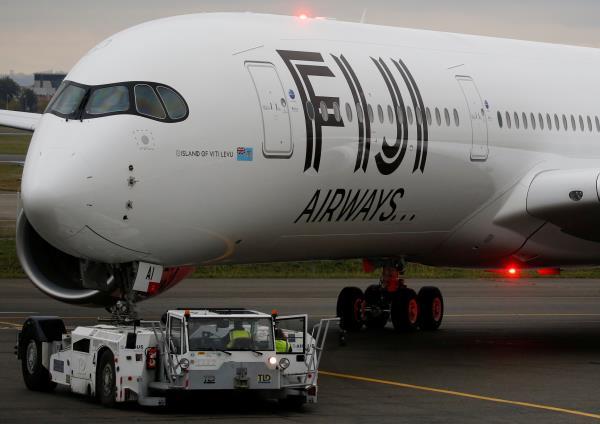 The first Airbus A350 XWB aircraft of Fiji Airways prepares to take off at the aircraft builder's headquarters of Airbus in Colomiers near Toulouse, France