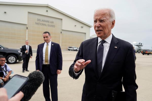 U.S. President Joe Biden boards Air Force One in New Castle, Delaware