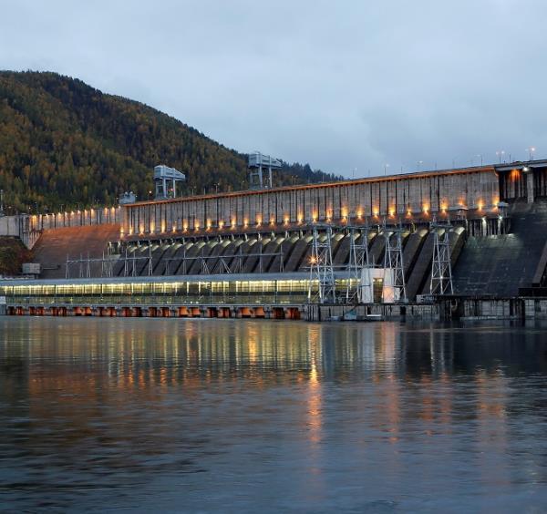 Hydroelectric plants offer existing grid connections and can complement solar supply. (Image: REUTERS_Ilya Naymushin)