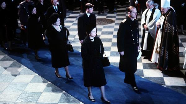The Queen and the Duke of Edinburgh lead mourners inside St. Paul's Cathedral, London, during the funeral service for Sir Winston Churchill. Behind are the Queen Mother and Prince Charles (later the Prince of Wales).