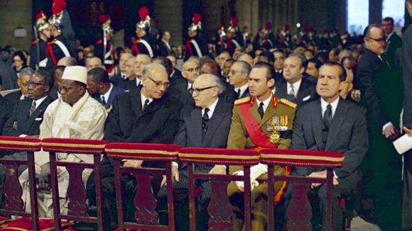 The funeral of former French President Charles De Gaulle at Notre-Dame Cathedral, Paris, France, on Nov. 12, 1970, was attended by many heads of state and members of European Royal families. President of the United States, Richard Nixon, sits right before the start of the service. (AP Photo)
PIC:AP