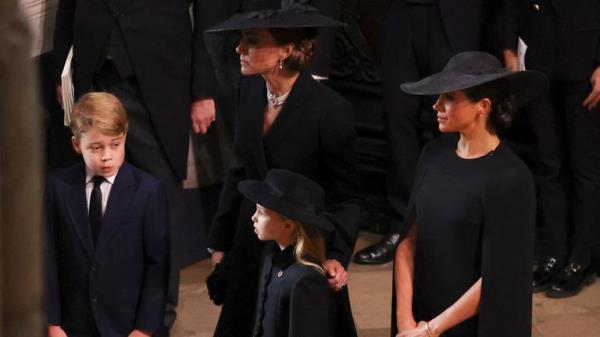 Britain's Catherine, Princess of Wales, Meghan, Duchess of Sussex Prince George and Princess Charlotte attend, on the day of the state funeral and burial of Britain's Queen Elizabeth, at Westminster Abbey in London, Britain, September 19, 2022. REUTERS/Phil Noble/Pool

