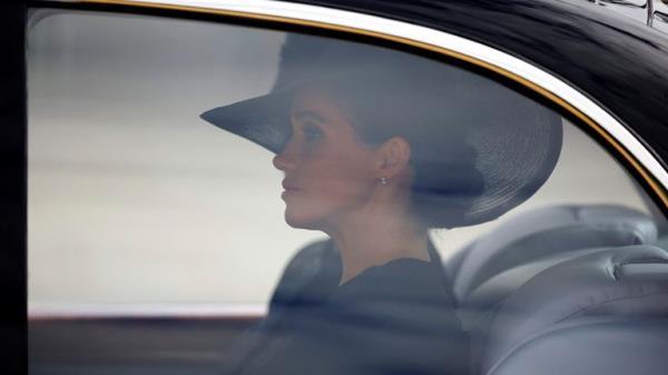 Britain's Meghan, Duchess of Sussex, sits in a car on the day of the state funeral and burial of Britain's Queen Elizabeth, at Westminster Abbey, in London, Britain, September 19, 2022. REUTERS/Sarah Meyssonnier/Pool
