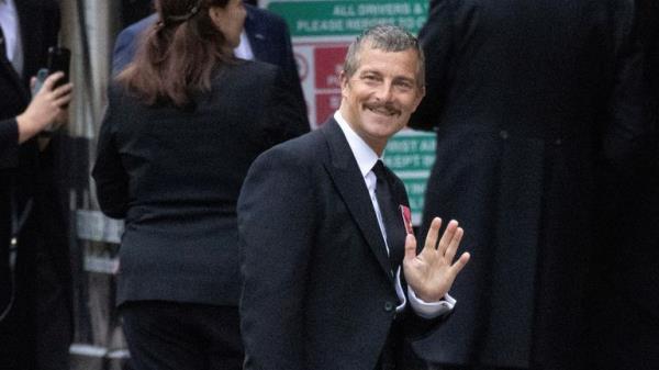 British television personality Bear Grylls gestures on the day of the state funeral and burial of Britain's Queen Elizabeth, outside Westminster Abbey in London, Britain, September 19, 2022.   Tim Merry/Pool via REUTERS