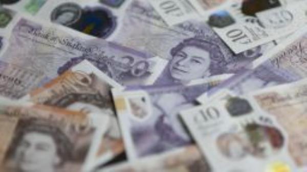 LONDON, UNITED KINGDOM a SEPTEMBER 21: In this illustration photo British pound banknotes are seen in London, United Kingdom on September 21, 2022. Rasid Necati Aslim / Anadolu Agency