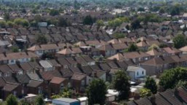 A general view of rows of terraced houses rooftops on a residential housing estate on August 11, 2022 in Romford, England. 