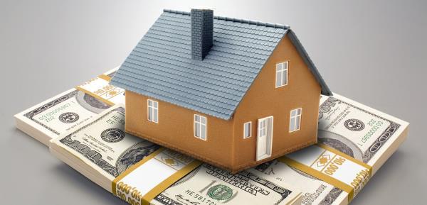 House on a pile of cash