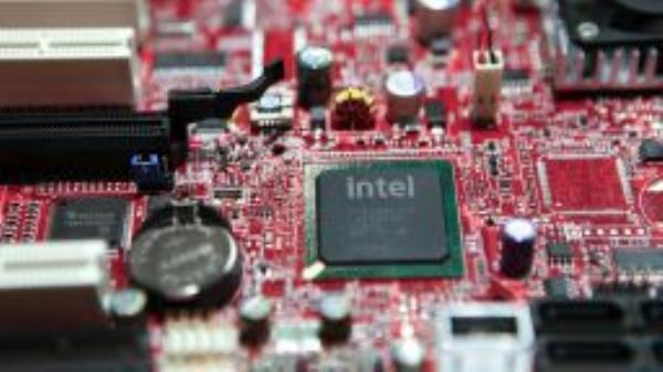 An Intel Corp. 32nm Westmere chip sits on display during the Microsoft Global Energy Forum in Houston, Texas, U.S., on Thursday, Jan. 21, 2010. 