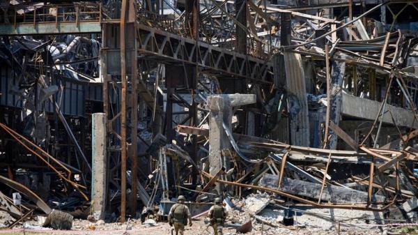Russian soldiers walk through debris of the metallurgical Combine Azovstal, in Mariupol, on the territory which is under the Government of the Donetsk People's Republic control, eastern Ukraine, Monday, June 13, 2022. The plant was almost completely destroyed during the siege of Mariupol. This photo was taken during a trip organized by the Russian Ministry of Defense. (AP Photo)
PIC:AP
