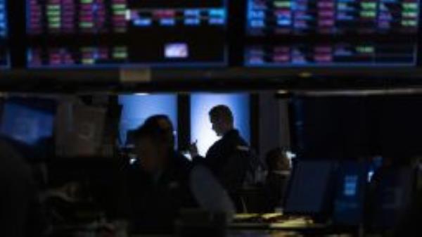 Traders work on the floor of the New York Stock Exchange in New York, New York, USA, 29 September 2022.